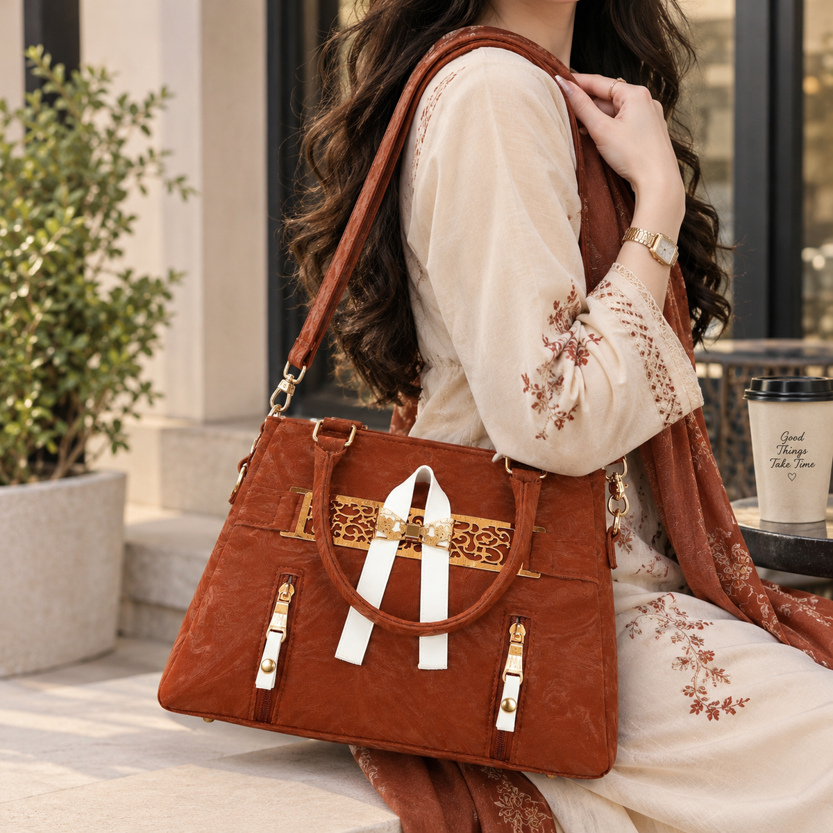 Rust brown textured handbag